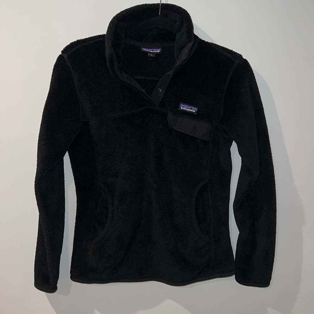 Patagonia black  snap pull over w/ big center pocket & one small chest pocket